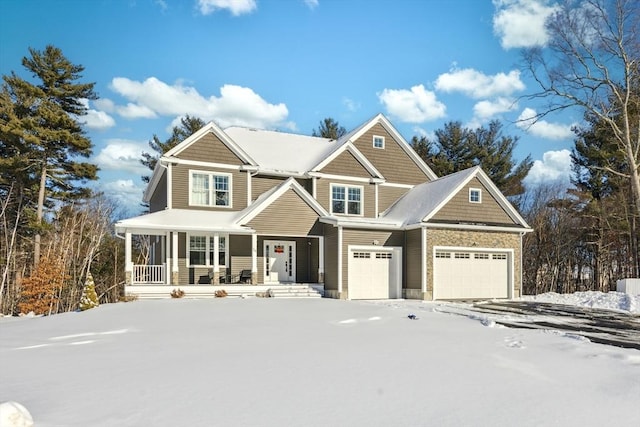 view of front of house featuring a garage and covered porch