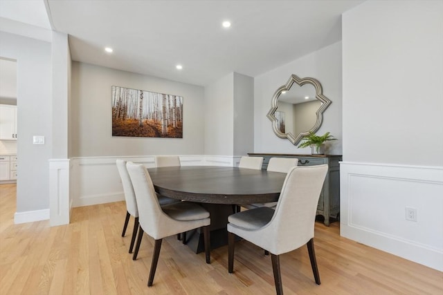 dining area featuring light wood-type flooring