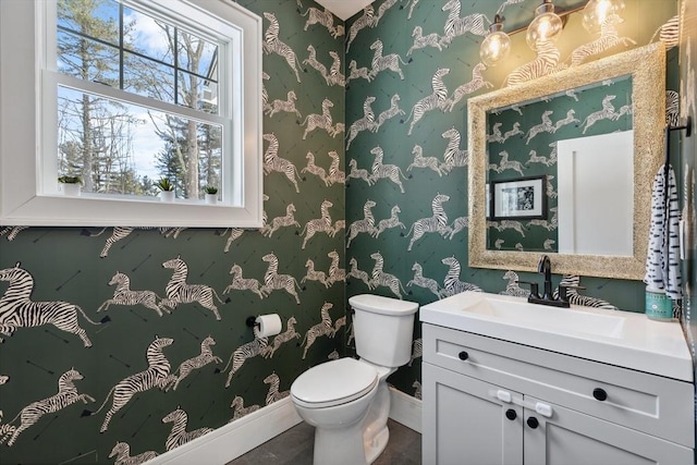 bathroom with vanity and toilet