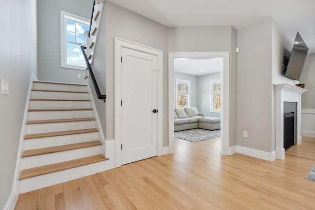 staircase featuring hardwood / wood-style flooring