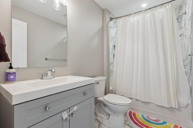 full bathroom featuring vanity, toilet, and shower / bath combo