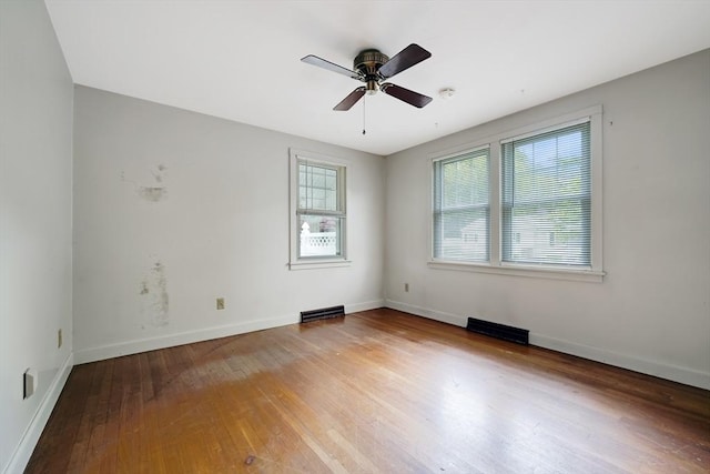 209 Sharp St, Dartmouth, MA 02747 - unfurnished room featuring wood-type flooring, ceiling fan, and baseboards