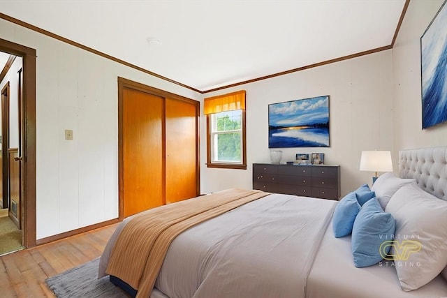209 Sharp St, Dartmouth, MA 02747 - bedroom with hardwood / wood-style floors, crown molding, a closet, and baseboards