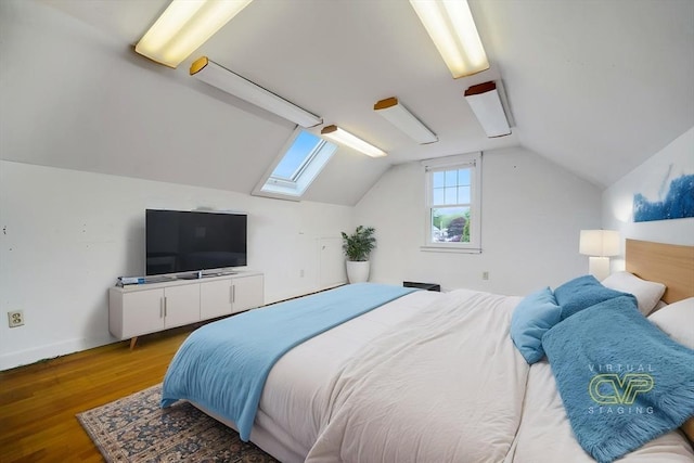 209 Sharp St, Dartmouth, MA 02747 - bedroom with wood finished floors, a skylight, lofted ceiling, and baseboards