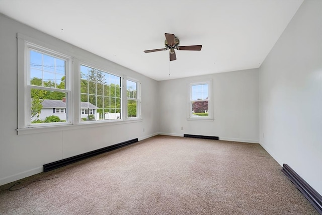 209 Sharp St, Dartmouth, MA 02747 - empty room featuring a baseboard radiator, plenty of natural light, and carpet flooring