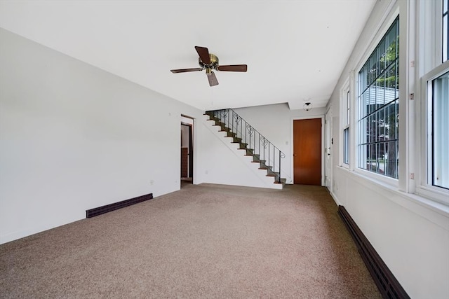 209 Sharp St, Dartmouth, MA 02747 - spare room featuring carpet flooring, stairway, and a ceiling fan