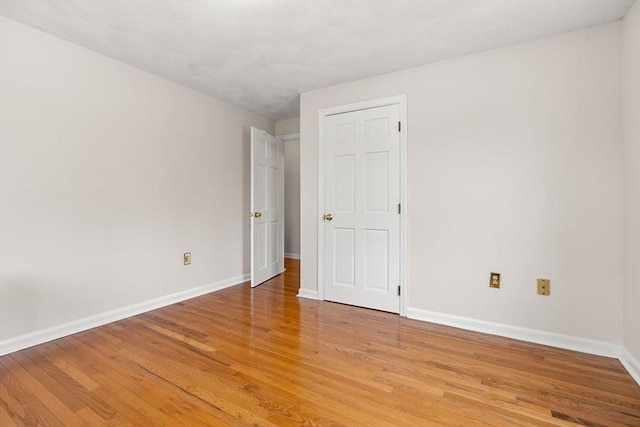 11 Douglas Ave, Burlington, MA 01803 - empty room featuring baseboards and light wood-style flooring