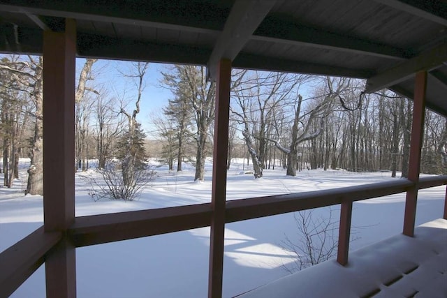 view of yard layered in snow