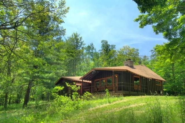 exterior space featuring a sunroom