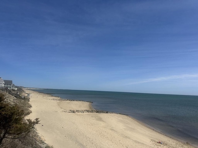 view of water feature with a beach view
