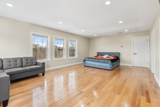 bedroom with light hardwood / wood-style flooring