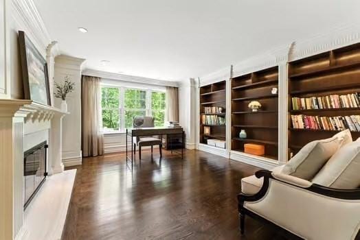 56 Cart Path Rd, Weston, MA 02493 - sitting room featuring crown molding, wood finished floors, an office area, and a glass covered fireplace
