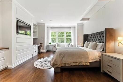 56 Cart Path Rd, Weston, MA 02493 - bedroom with dark wood-type flooring and crown molding