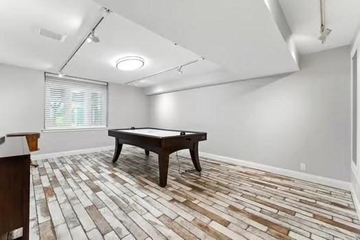 56 Cart Path Rd, Weston, MA 02493 - recreation room featuring rail lighting and wood finished floors