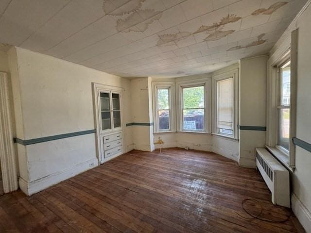 99 Beacon St, Boston, MA 02136 - unfurnished room featuring radiator and dark wood-style floors