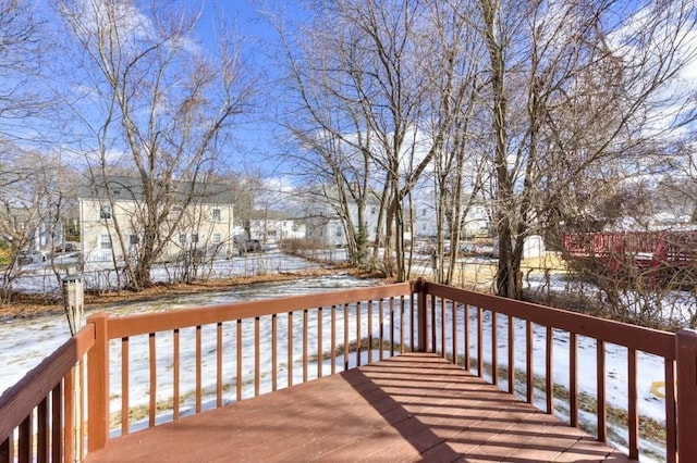 view of snow covered deck