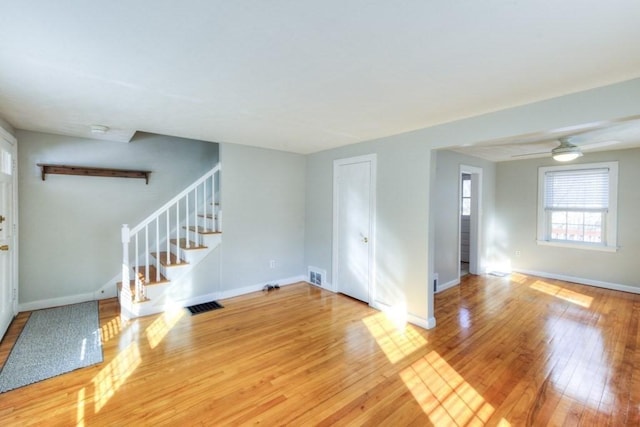 interior space with hardwood / wood-style flooring and ceiling fan