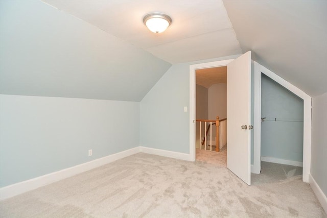 16 W St, Natick, MA 01760 - bonus room with carpet, lofted ceiling, and baseboards