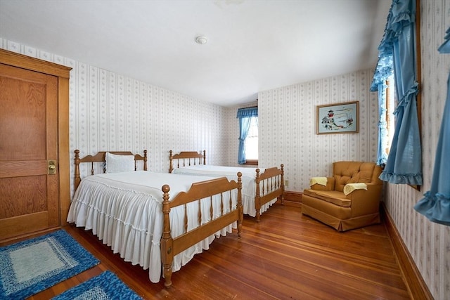 bedroom featuring dark wood-type flooring