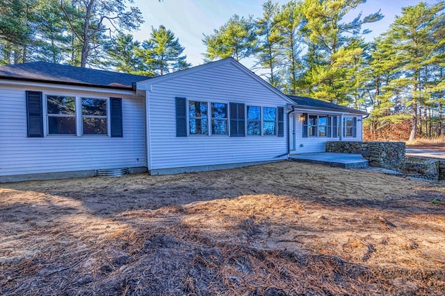 back of house with a patio