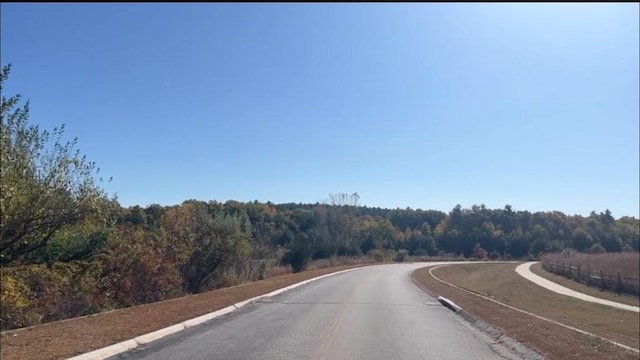 view of street with a view of trees