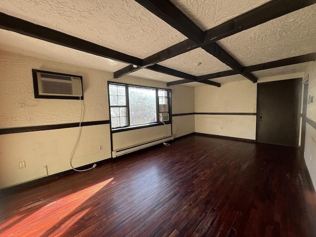 unfurnished room featuring a textured ceiling, hardwood / wood-style floors, a baseboard radiator, and beam ceiling