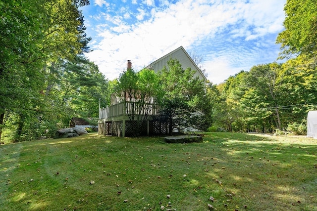 view of yard with a deck