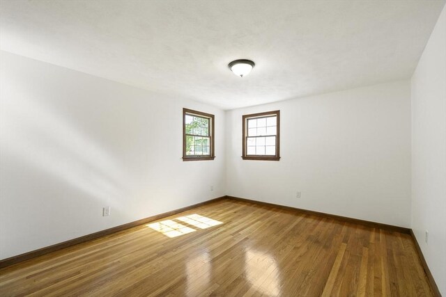 32 Arden St, Holyoke, MA 01040 - spare room featuring wood finished floors and baseboards
