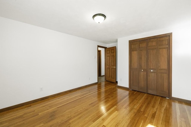 32 Arden St, Holyoke, MA 01040 - unfurnished bedroom featuring light wood-type flooring, baseboards, and a closet