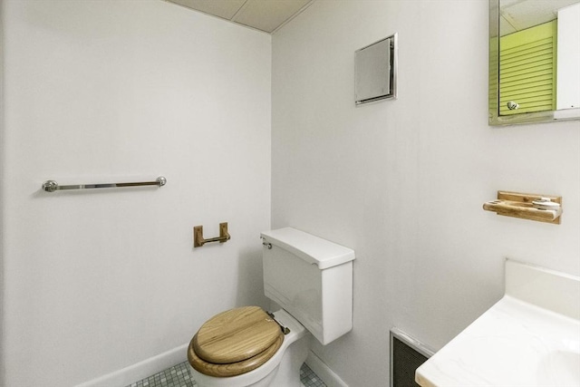32 Arden St, Holyoke, MA 01040 - bathroom with baseboards and toilet