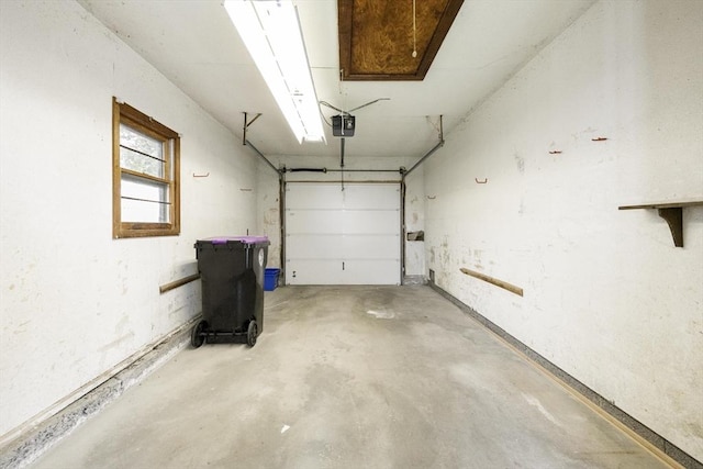 32 Arden St, Holyoke, MA 01040 - garage featuring a garage door opener