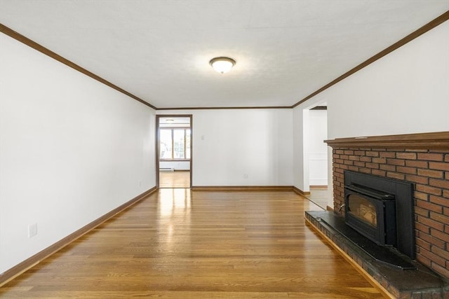 32 Arden St, Holyoke, MA 01040 - unfurnished living room featuring ornamental molding, light wood-type flooring, and baseboards