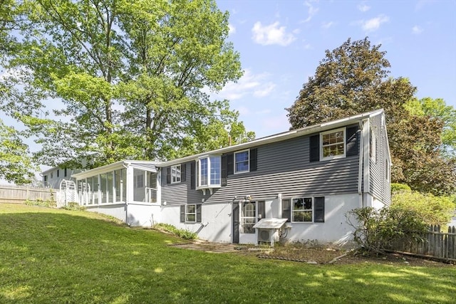 32 Arden St, Holyoke, MA 01040 - rear view of property featuring a sunroom