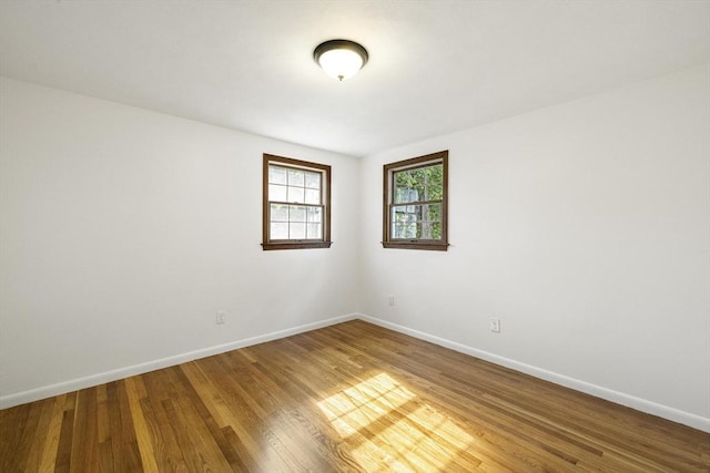 32 Arden St, Holyoke, MA 01040 - spare room with baseboards and wood finished floors