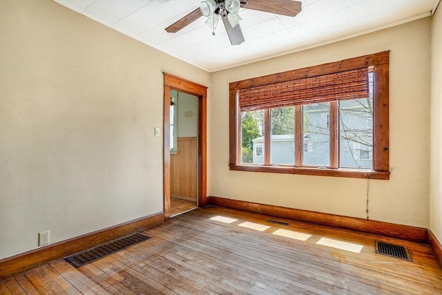 101 Euclid St, Gardner, MA 01440 - spare room with wood-type flooring, baseboards, a ceiling fan, and ornamental molding
