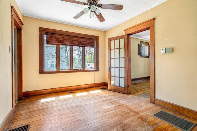 101 Euclid St, Gardner, MA 01440 - unfurnished room with baseboards, light wood-style floors, ornamental molding, and ceiling fan