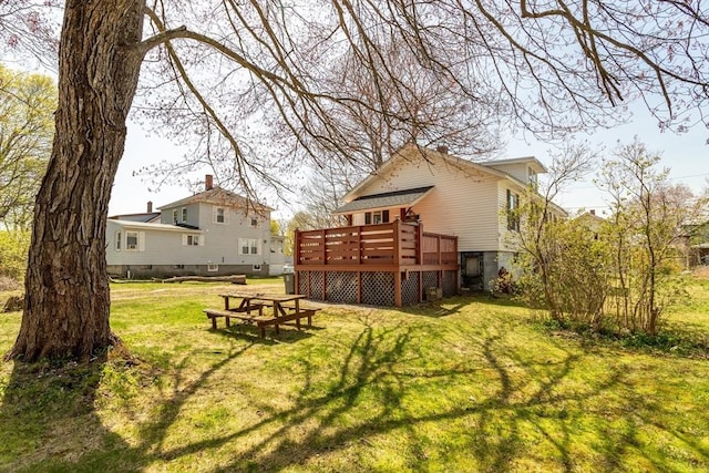 101 Euclid St, Gardner, MA 01440 - rear view of house featuring a deck and a yard