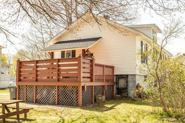101 Euclid St, Gardner, MA 01440 - rear view of house with a yard, a shingled roof, and a deck