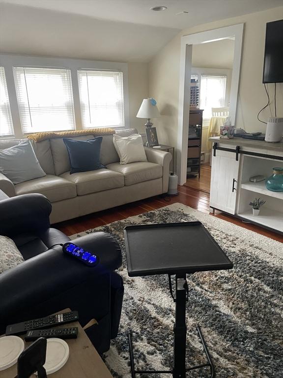 living room with wood finished floors