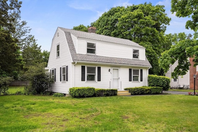 464 Ralph Talbot St, Weymouth, MA 02190 - colonial inspired home with a gambrel roof, a chimney, and roof with shingles