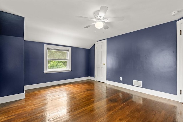 464 Ralph Talbot St, Weymouth, MA 02190 - empty room featuring vaulted ceiling, ceiling fan, wood finished floors, baseboards, and a smoke detector