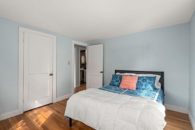 106 Nevada St, Newton, MA 02460 - bedroom featuring wood finished floors and baseboards