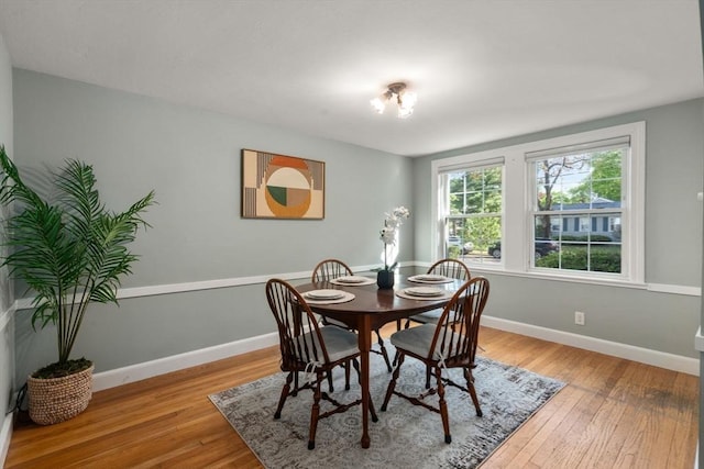 106 Nevada St, Newton, MA 02460 - dining space featuring light wood-style flooring and baseboards