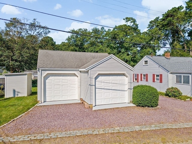 view of front of home with a storage unit