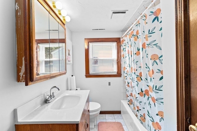 full bathroom featuring a textured ceiling, vanity, tile patterned flooring, toilet, and shower / bath combo