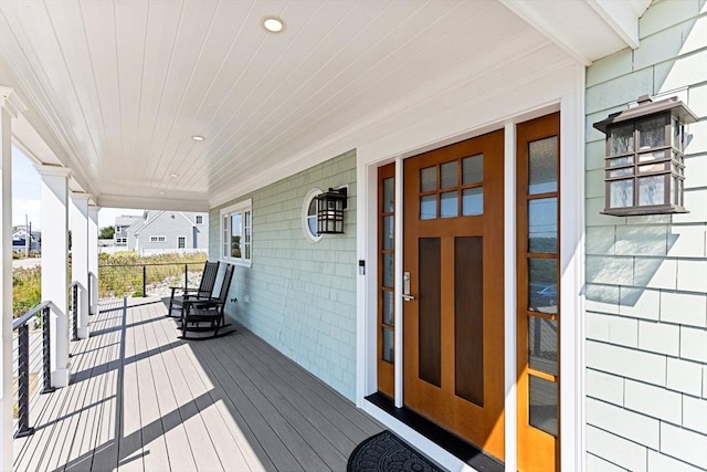 wooden deck featuring a porch