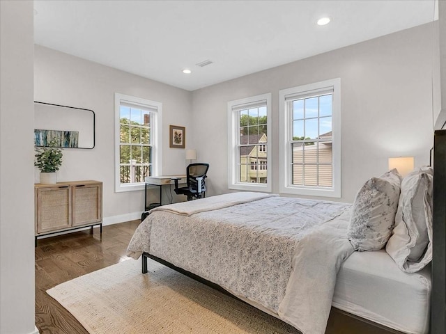 72-74 Grafton St Unit 2, Arlington, MA 02474 - bedroom with wood finished floors, baseboards, and recessed lighting