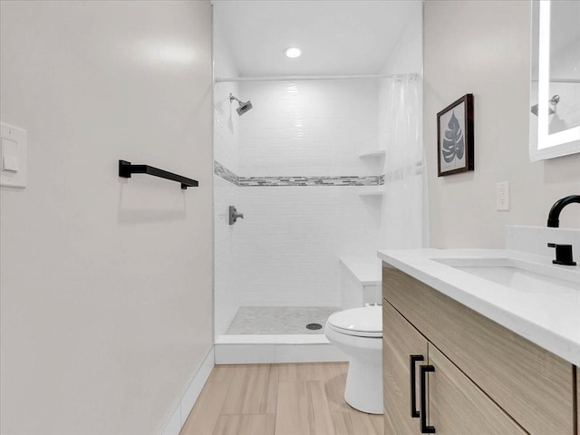72-74 Grafton St Unit 2, Arlington, MA 02474 - full bath with toilet, vanity, a tile shower, and recessed lighting