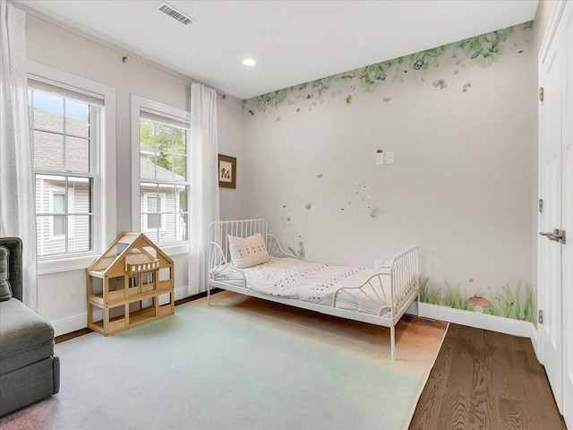 72-74 Grafton St Unit 2, Arlington, MA 02474 - bedroom featuring wood finished floors, baseboards, and recessed lighting