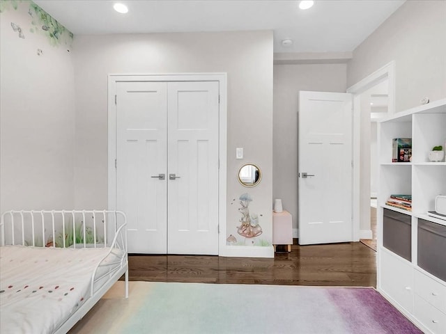 72-74 Grafton St Unit 2, Arlington, MA 02474 - bedroom with wood finished floors, recessed lighting, a closet, and baseboards